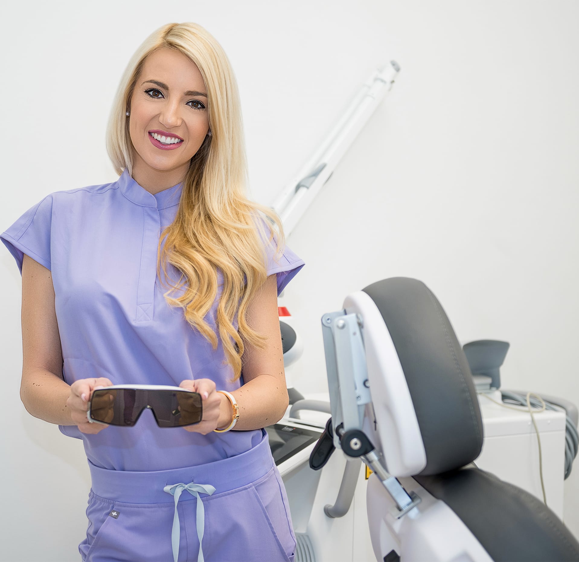 Doctor holding eye glasses